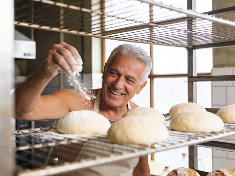 A smiling senior baker