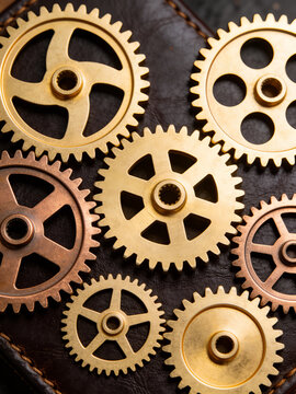Group of assorted bronze cogwheels