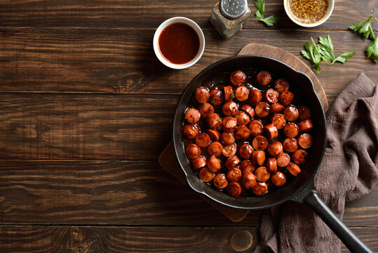 Bbq smoked sausage bites in cast iron skillet