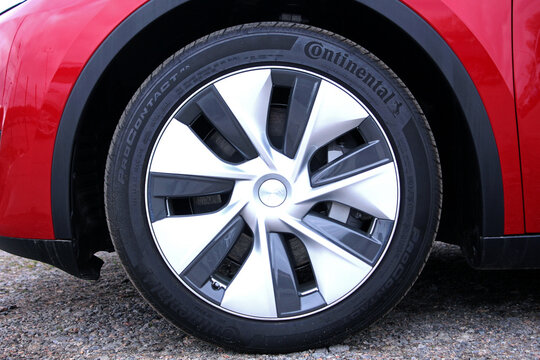 Vinnytsia, Ukraine; April 10, 2026. Close up Tesla Y front wheel. Continental tyre. Tesla Wheel Alloy Wheels Rim. Tesla Y braking system. Sleek silver alloy wheel with multi-spoke design on black Cont