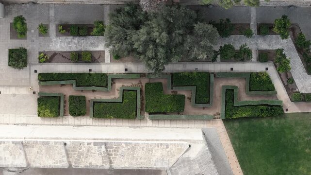 Geometric garden in Mdina moat