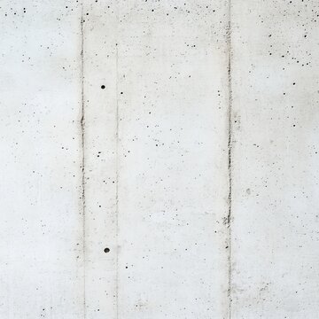 Minimalist light gray concrete wall texture, full frame vertical background with raw industrial surface details, pores and distinct formwork tie holes. building, architecture