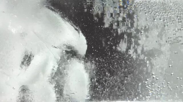 a splash of fizzy drink in a glass, the picture can be made into a portrait