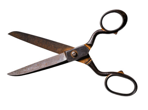Isolated old and rusty sewing scissors with blades slightly open, classic tailoring tool