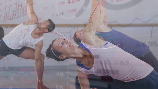 Diverse class moving after cue, holding rotated side-bend lunge on mats with overlay charts