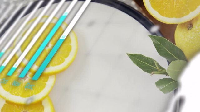 Displaying central white bowl rotating on wooden board, showing lemons and code overlays