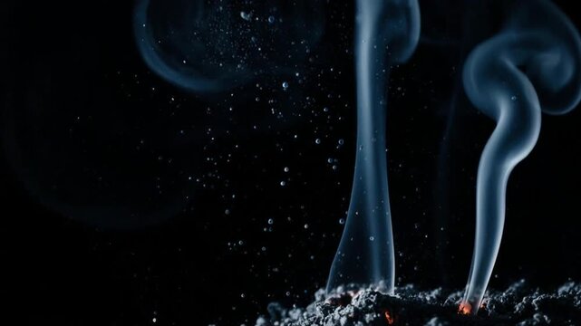 灰と煙の粒子・マクロ接写・神秘的なブラックバックグラウンド