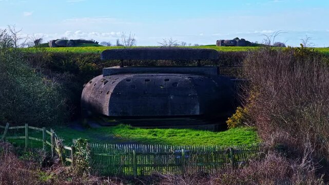 Longues-sur-Mer battery casemates standing in a field in Normandy, France
