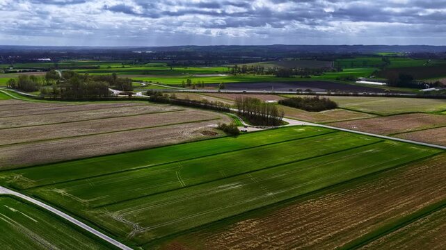 France farmland patterns showing land utilization and agricultural cultivation, aerial view
