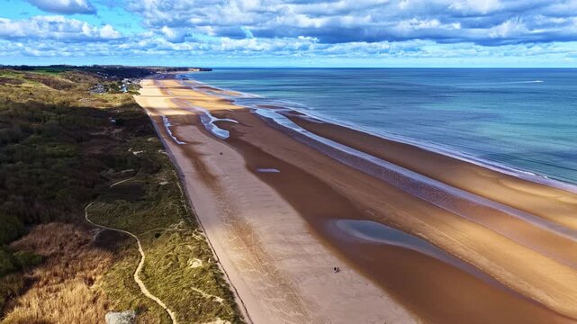 Normandy coast at Omaha Beach, France, overlooking the historic landing site in aerial view