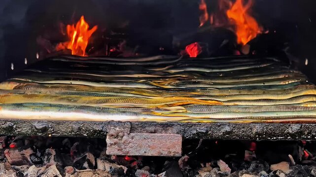 Close-up of fresh fish grilling over hot coals with open flames, smoky outdoor cooking scene with crispy skin and glowing embers&mdash;rustic campfire barbecue food.