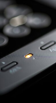 Close-up of a power button on a device.