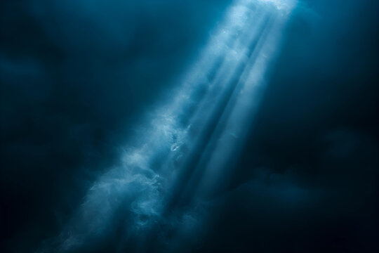 Abstract light rays in deep blue atmosphere with volumetric fog. Cinematic background with soft glow and mystical mood, ideal for design, wallpaper and creative visuals.