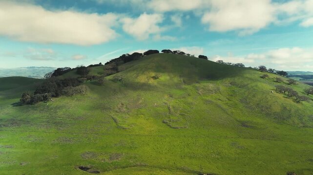 Clouds over a Green Hilltop Timelapse
