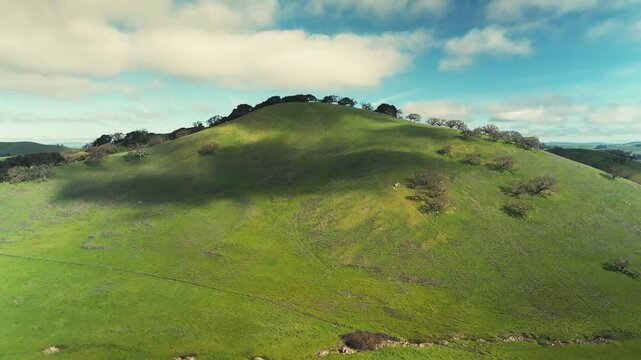 Clouds over a Green Hilltop Timelapse