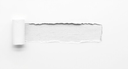 Obraz premium White background with torn cardboard featuring a jagged hole