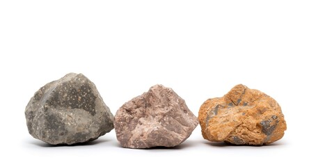 Obraz premium Three textured mineral stones set against a white background highlighting geological structures with copy space