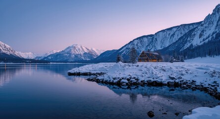 Naklejka premium Winter evening mountain and water vista showcasing a house in natural light