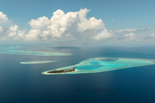 Aerial view of islands and atolls in the Indian ocean, Maldives