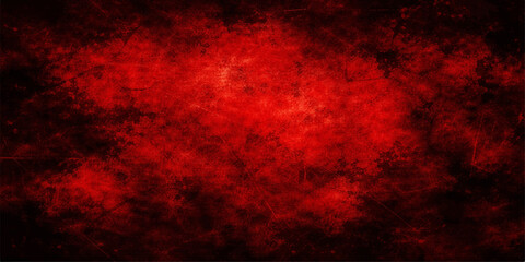 Obraz premium A dark grunge red background featuring textured paint and black smoke patterns that create a hot inferno flame design with orange light for an art wallpaper backdrop