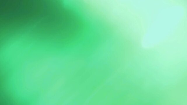 A vibrant green gradient background with a smooth texture and soft lighting, ideal for use as a backdrop or overlay or transitions