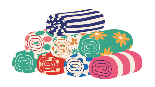 Stack of colorful rolled up blankets or towels with various patterns like stripes, polka dots, and flowers in vibrant hues.