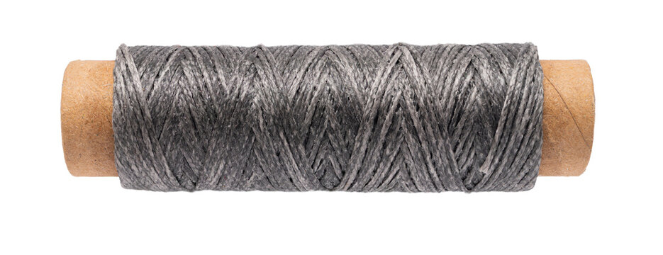 spool of colored thread on a white isolated background