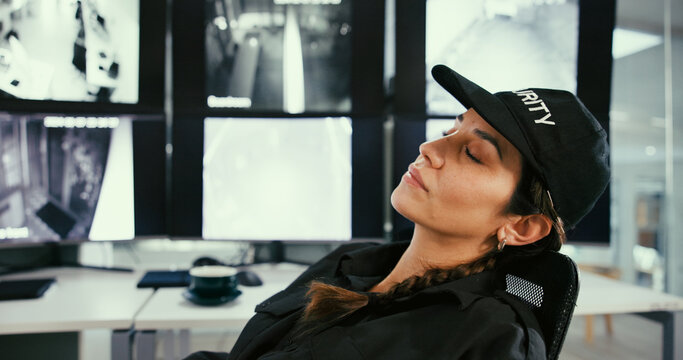 Sleeping, security and woman in control room with fatigue, narcolepsy and slacker by surveillance. Female guard, nap and workplace with burnout by computer, screen or technology for safety on shift