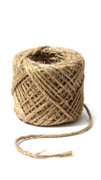 A spool of twine on a white background (1)