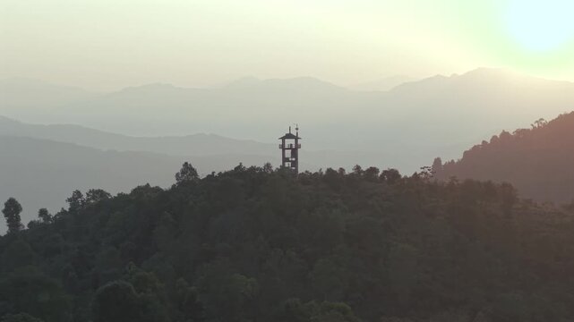 Aerial Drone View of Hilltop Watchtower at Sunrise in Nagaland, Northeast India