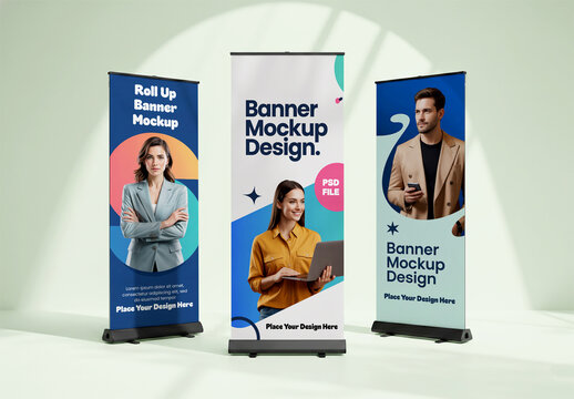 Three Roll Up Banner Mockups with Business Professional Designs and Soft Interior Lighting