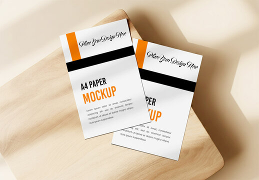 Two A4 Paper Mockups on Wooden Cutting Board with Sunlight and Soft Shadows