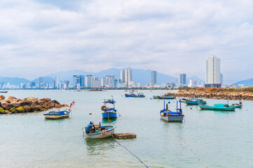 Panorama of Nha Trang city in Vietnam. Panoramic view of the Nha Trang with fishing boats in the sea