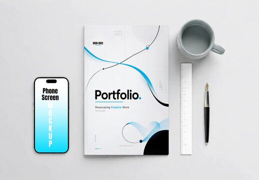 Portfolio Book and Smartphone Screen Mockup on White Surface with Pen Ruler and Coffee Cup