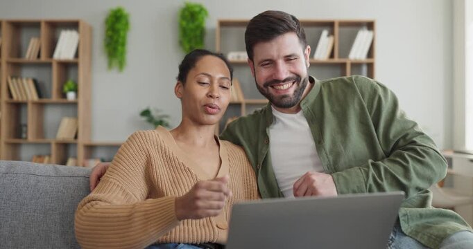 Couple online shopping at home on laptop. They compare prices, read reviews, and choose safe payment options. Smooth checkout and delivery planning boost convenience. Clear idea of web buy.