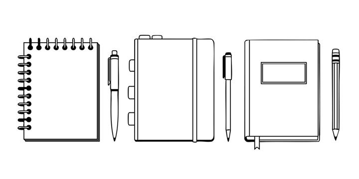 Stationery items including notebooks and pens arranged on a surface