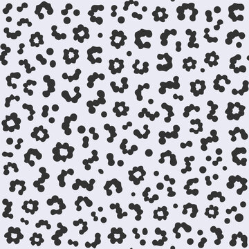 Stylized animal print background with natural spots, ideal for fashion textile