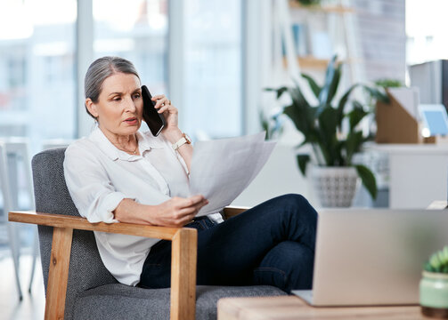Phone call, review or woman in agency with paper, draft feedback or source contact on article. Conversation, document or mature journalist with tech, fact check or information gathering on news story