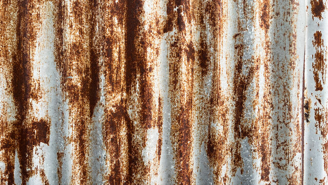 Low angle of rusty roof. Top view, high angle, above. home, house. background. copy space, empty, free, negative, text, design. side, front. grey, gray. iron. brown. rustic.