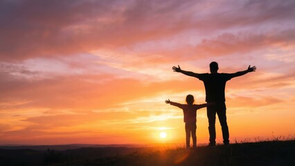 Fototapeta premium Silhouette of Father and Daughter Enjoying Sunset with Arms Outstretched in Nature