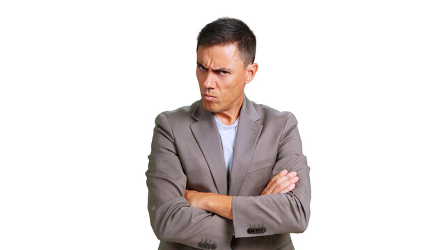 Angry businessman frowning with arms crossed transparent background