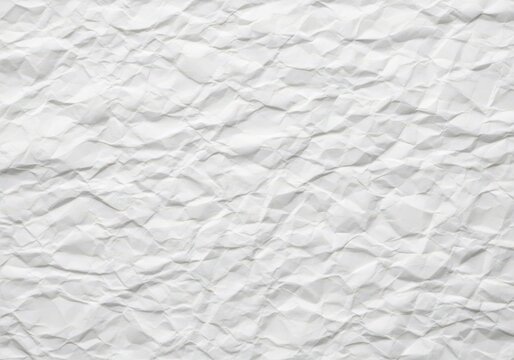 A close-up view of a crumpled white paper texture