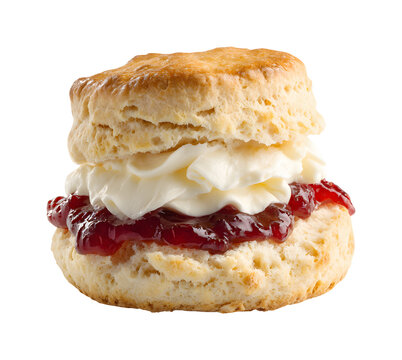 Fresh English scone with clotted cream and strawberry jam isolated on transparent background
