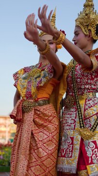 Traditional Thai Khon Dancers Perform in Front of Wat Suthat Temple