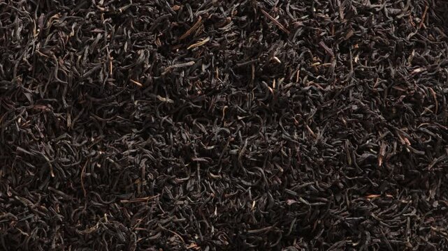 black tea leaves top view food backgroud zoom