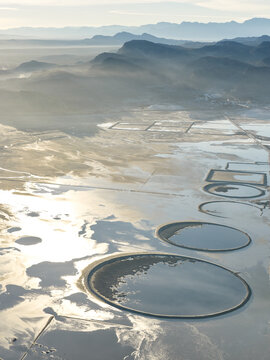 Strange Patterns in Evaporation Ponds in Industrial Wasteland in
