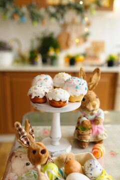 Easter table with traditional cake and cute chicks, spring  decor