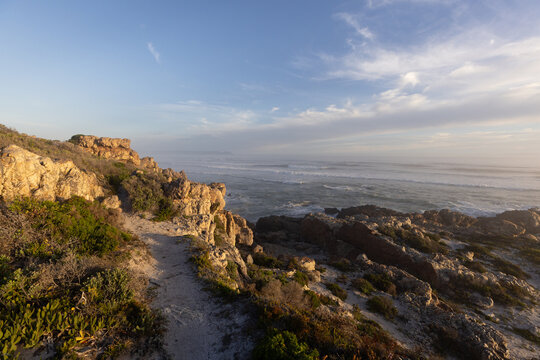 sunset over beautiful rocky coastal beaches of Hermanus, South Africa