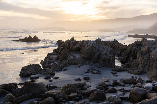sunset over beautiful rocky coastal beaches of Hermanus, South Africa