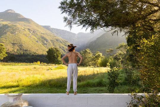late afternoon light over fields, trees and canyon, Swellendam, South Africa